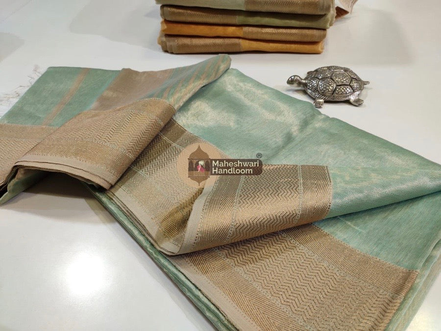 Exclusive Sea Green Maheshwari Tissue Weaving Saree With Broad Zari Border 07