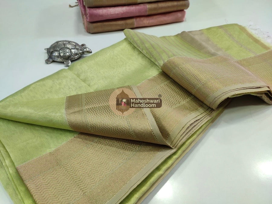 Exclusive Light Pista Green Maheshwari Tissue Weaving Saree With Broad Zari Border 03