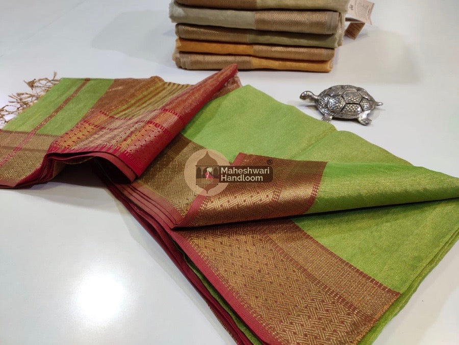 Exclusive Mehendi Green Maheshwari Tissue Weaving Saree With Broad Zari Border 015